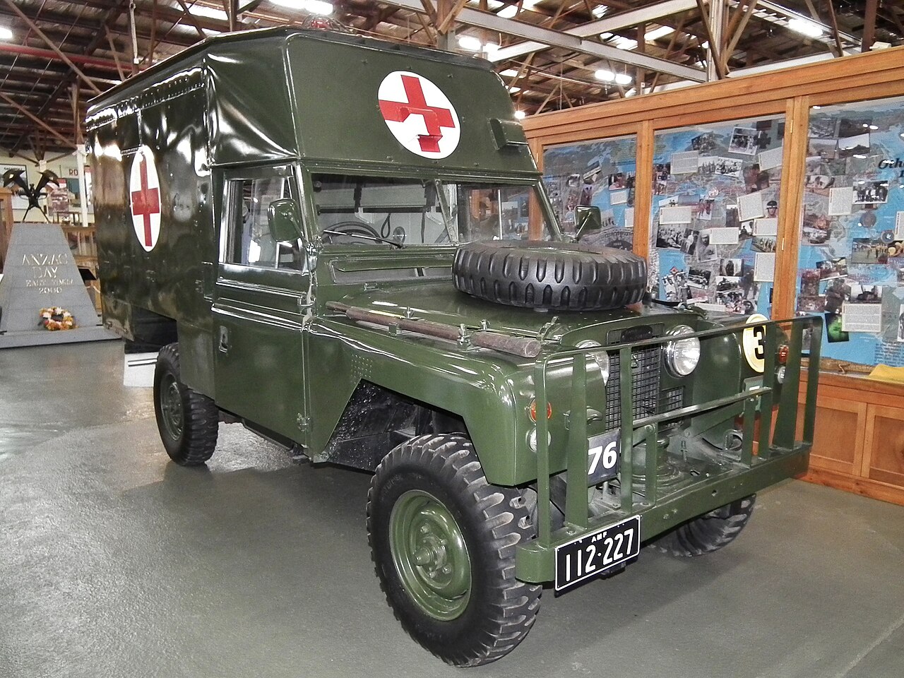 Series II Ambulance — Preserved 109-inch "Bloodbox" ambulance ARN 112-227, a 1963 Series 2A, in bronze green with red crosses on white discs at the Army Museum Bandiana, Victoria