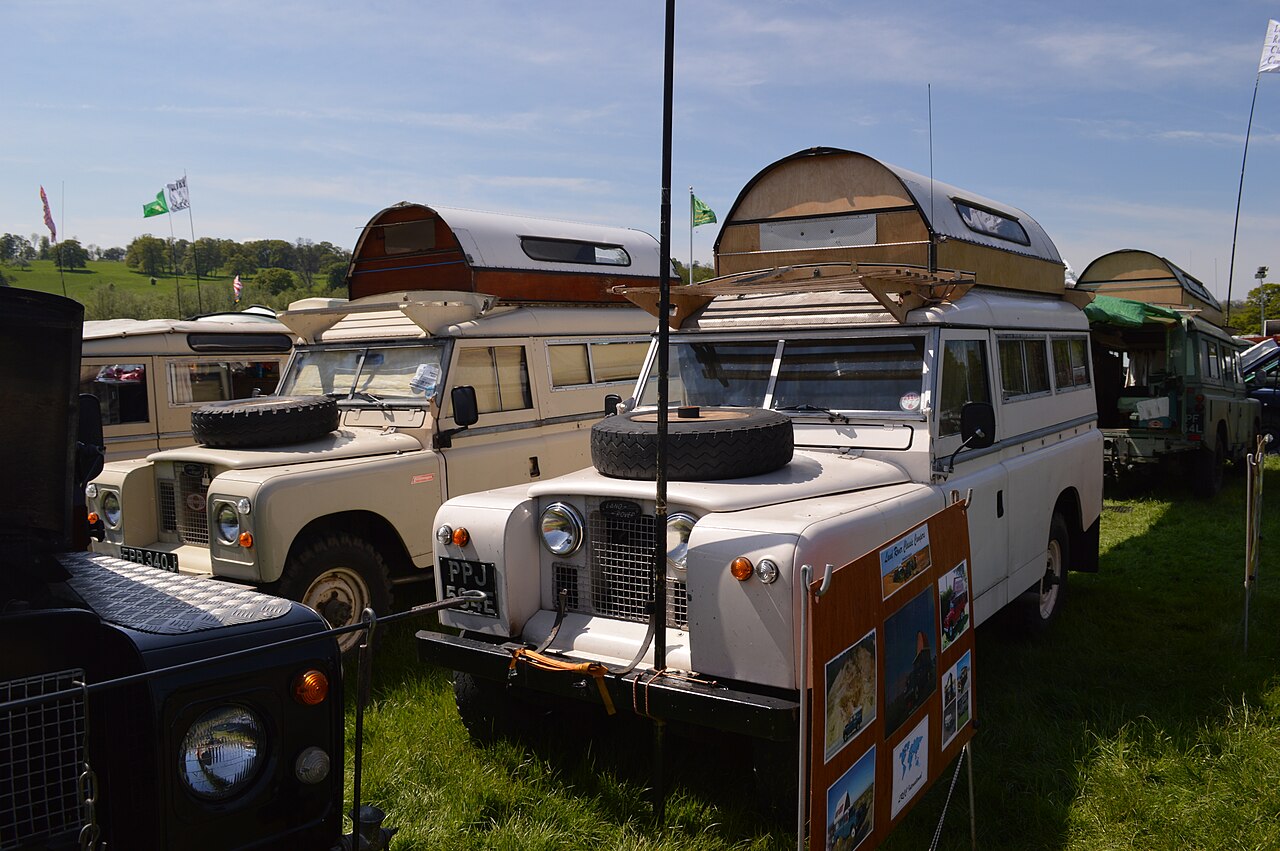 Carawagon conversions with the Searle elevating arched roof raised, at a Land Rover gathering in North Yorkshire — civilian examples of the same roof system used on the military command vehicles