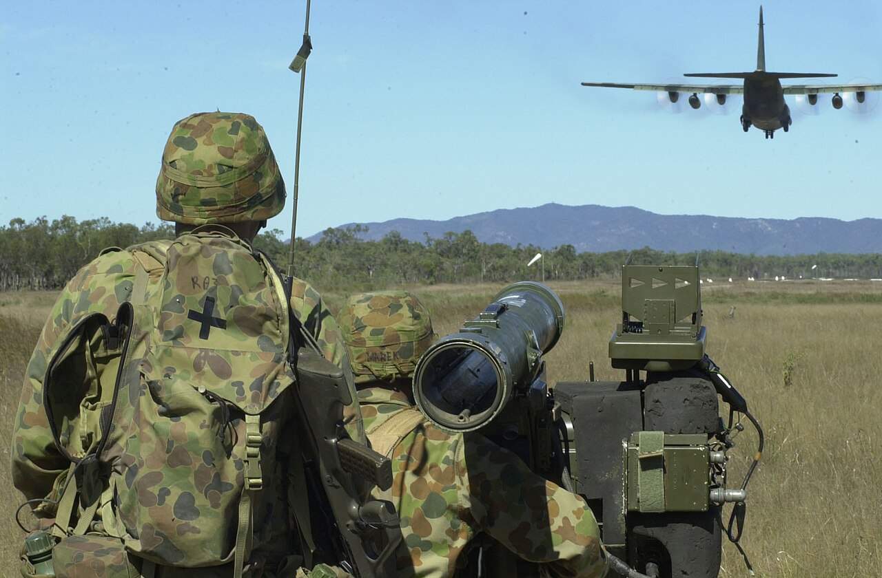 Perentie 6×6 Air Defence — Royal Australian Artillery gunners engage a C-130 with an RBS-70 launcher and target data receiver at Williamson Airfield, Shoalwater Bay, May 2001. No freely licensed photograph of the Air Defence Perentie itself could be found; this shows the missile system whose rounds and equipment the vehicle carried.