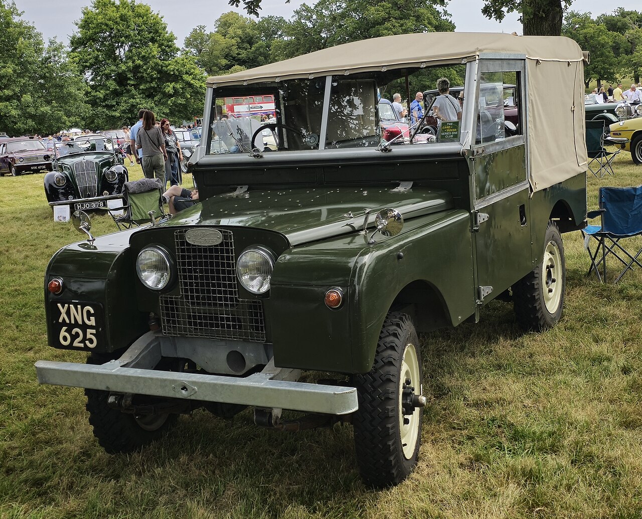 Series I 88″ — 1958 Land Rover Series I 88-inch soft top in bronze green