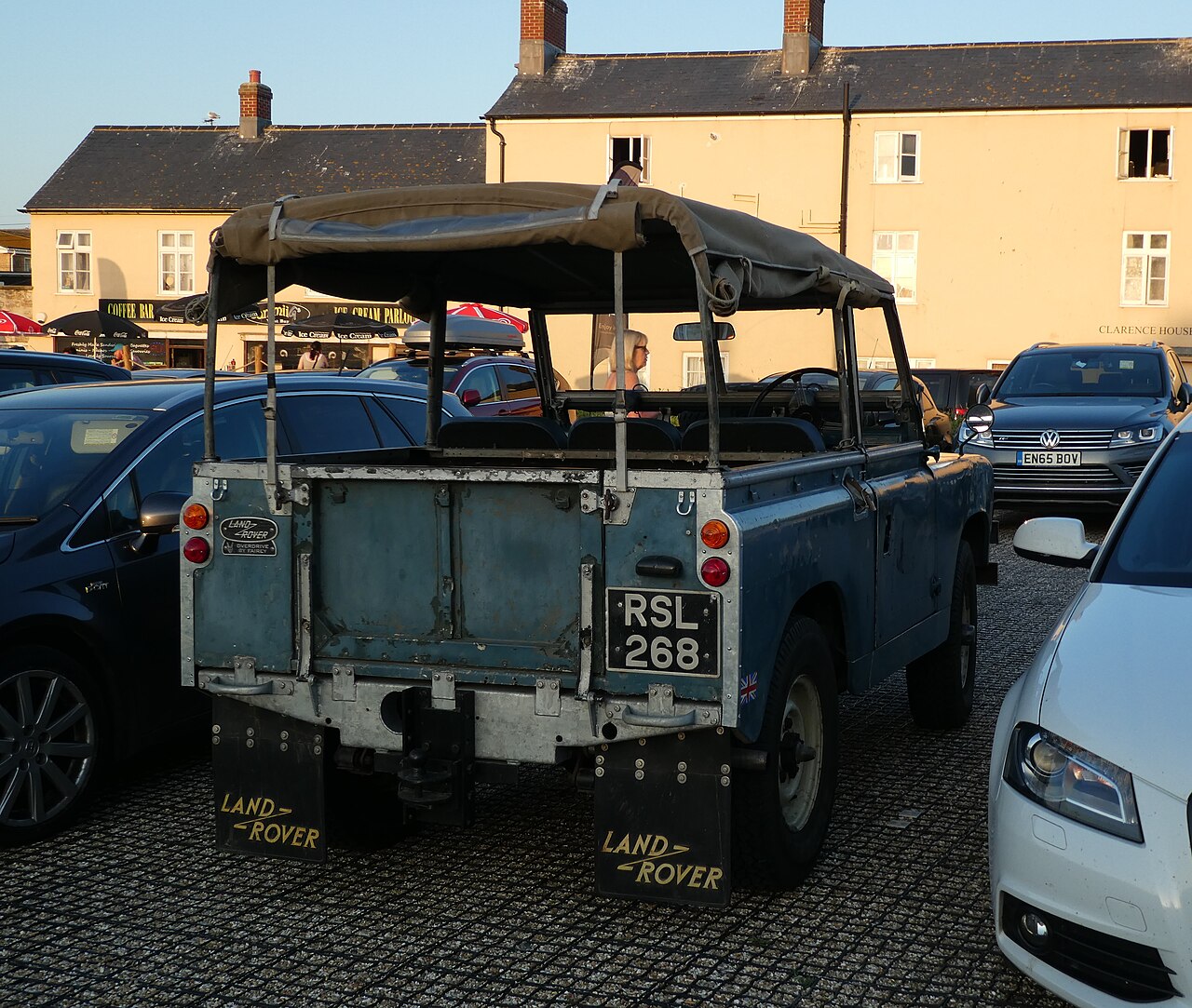 Series II 88″ — 1959 Series II 88" soft top in Weymouth, England, its canvas tilt rolled up