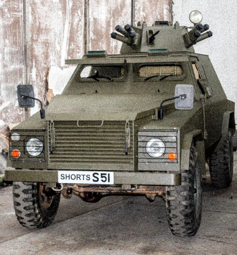 Shorland S51 APC — Shorts demonstrator carrying the trade plate "SHORTS S51": the Series 5 armoured front body, wheel-arch guards and the turret with twin triple smoke dischargers