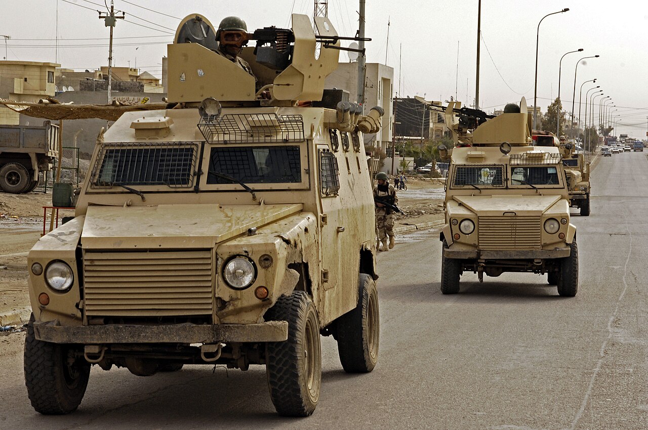 Shorland S55 APV — Turkish-built Otokar ZPT, the licensed derivative of the S55, on patrol with the Iraqi Army in Mosul, February 2008 — the S55 hull form with Otokar's later one-piece front wings and a roof gun shield