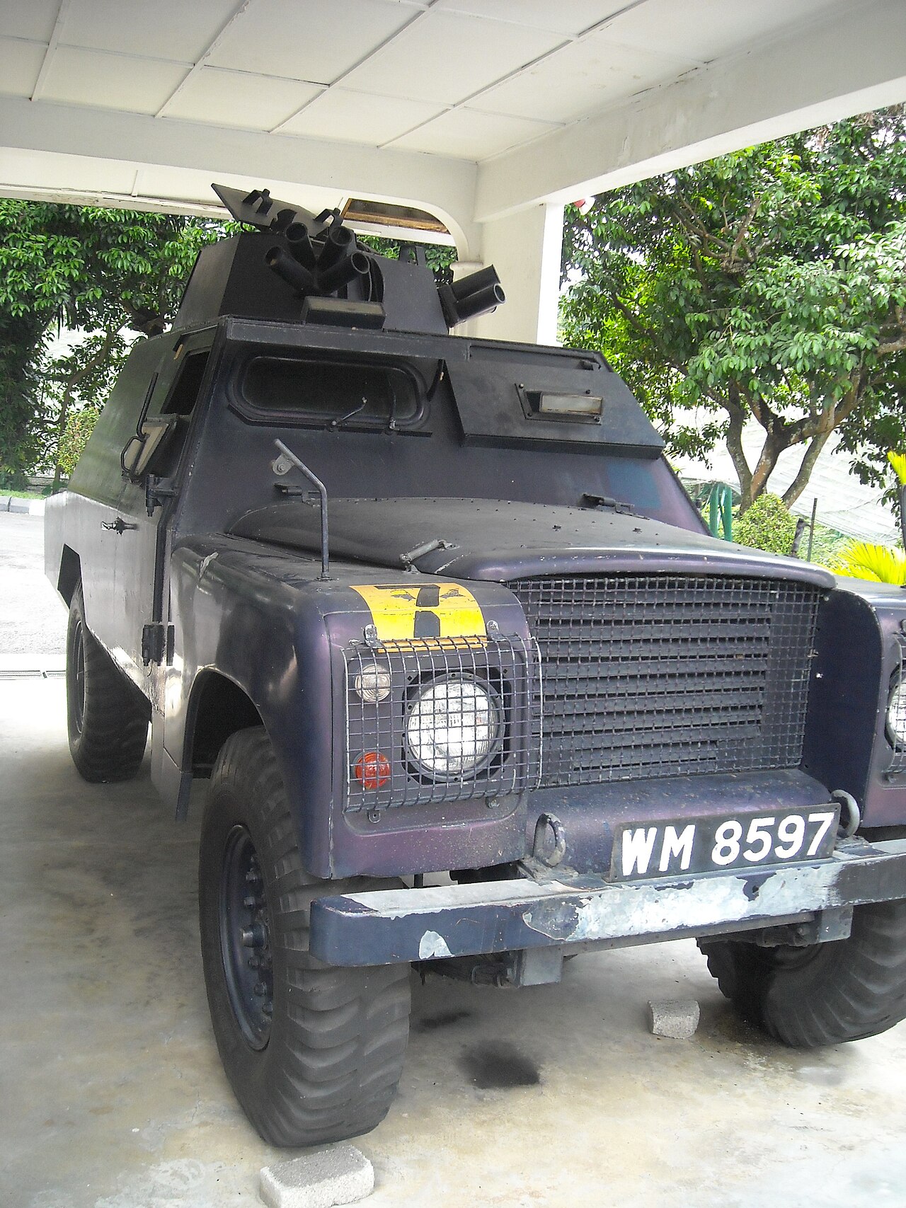 Shorland SB401 APV — Enclosed-body armoured Land Rover of the Royal Malaysia Police at the RMP Museum, Kuala Lumpur. Commons files it under the Shorland armoured car, but the uploader describes it as a Defender-based tactical vehicle, so it is a later member of the enclosed APV line rather than a confirmed SB.401; no free photograph of a confirmed SB.401 was found.